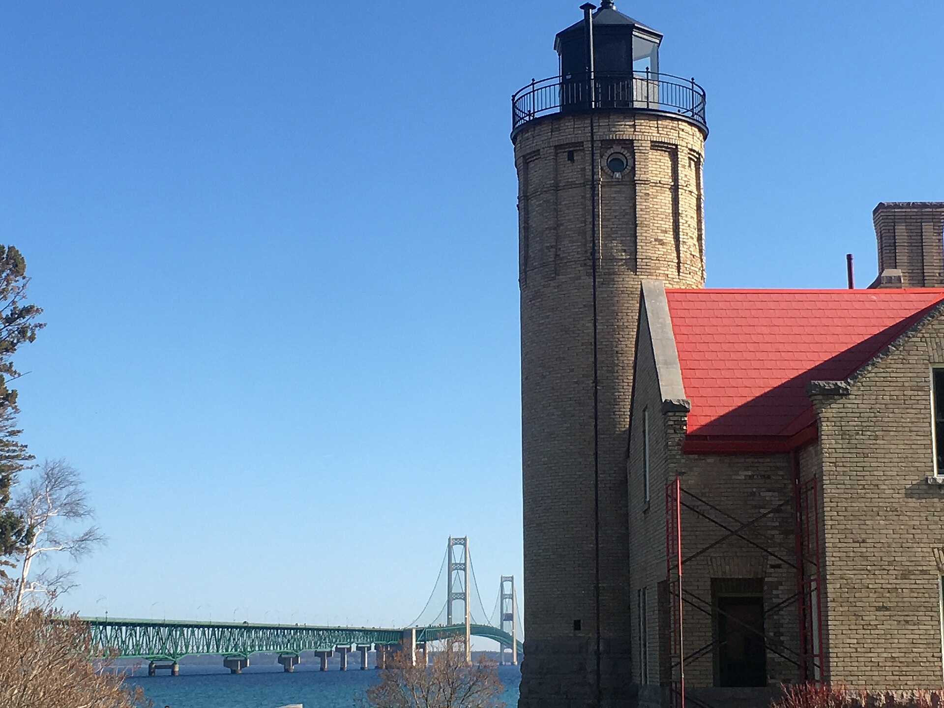 Old Mackinac Point Lighthouse and the Mackinac Bridge at the Straits.